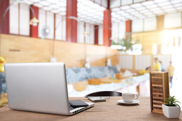 .Desk Workplace with a comfortable work table in the background that is used