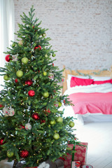 bedroom with Christmas tree and decorations