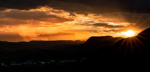 Sunsetting in the mountains over the desert