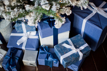 gift boxes near Christmas tree