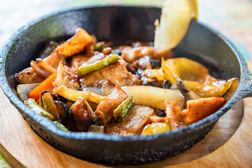 Close up delicious freshly cooked seafood stew with vegetables