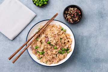 Japan fired rice with peas and chopstick