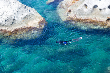 diving sub and rock in transparent Mediterranean sea in ischia forio
