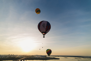 Colorful balloons flying over Nizhny Novgorod Russia at sunset