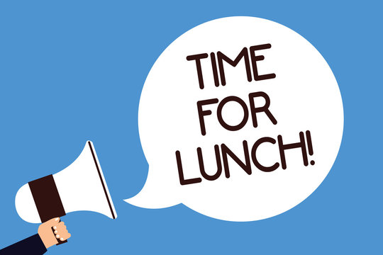 Writing note showing Time For Lunch. Business photo showcasing Moment to have a meal Break from work Relax eat drink rest Man hold megaphone loudspeaker speech bubble screaming blue background