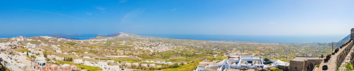 Top north view of the greek Santorini isle, from Pyrgos with aluminium cans for the easter fire...