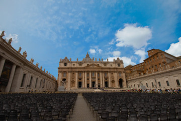 St. Peter's Basilica during the day with a beautiful blue sky in the Vatican