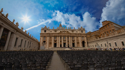 St. Peter's Basilica during the day with a beautiful blue sky in the Vatican
