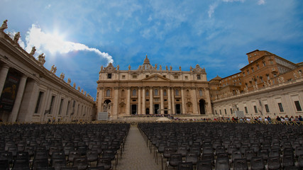 St. Peter's Basilica during the day with a beautiful blue sky in the Vatican