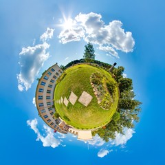 Mini planet Earth. Little planet earth with 360 viewing angle. Globe panorama of world. Summer little planet with trees, green grass and sun.