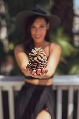 Tall mixed race woman in summer fashion poses outdoors