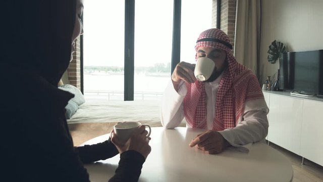 Positive young arabic couple in love young sheikh and his wife