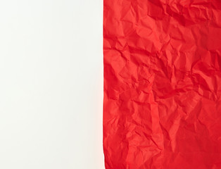 crumpled red  paper on a white background