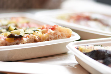 Veggie pizza in boxes with thick crust. Vegetarian friendly food.