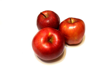 Fototapeta na wymiar Three fresh red apples on white background isolated