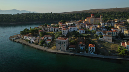 Naklejka na ściany i meble Aerial drone photo from picturesque seaside fishing village and port of historic Galaxidi, Fokida, Greece