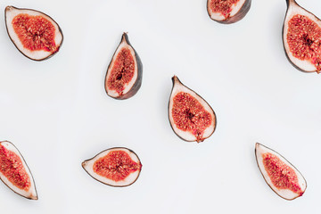 Fresh ripe figs on white background. Top view.