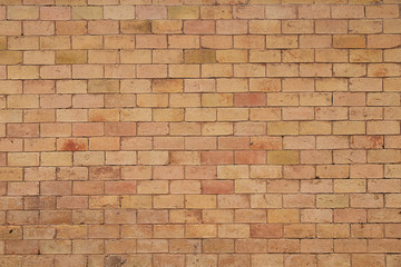 Obraz premium Background of stones and cobblestones. Fragment of a brick wall.
