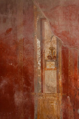 Colorful frescos on the walls of antique interior. Pompeii