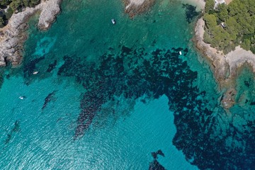 Aerial view to ocean with boats and coast