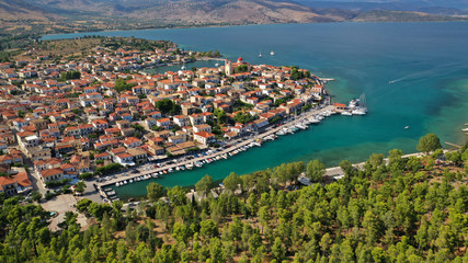 Naklejka na ściany i meble Aerial drone photo from picturesque seaside fishing village and port of historic Galaxidi, Fokida, Greece