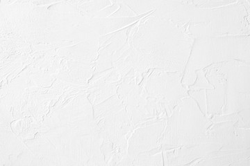 Neutral white colored low contrast Concrete textured background with roughness and irregularities to your concept or product.