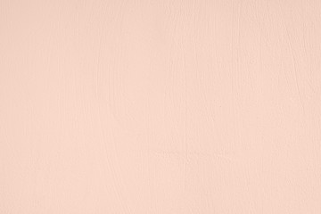 Pale pink colored low contrast Concrete textured background with roughness and irregularities