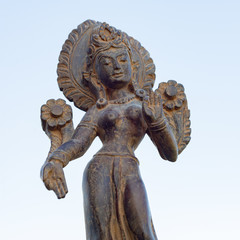 Wooden Buddha standing statue yoga relax focus