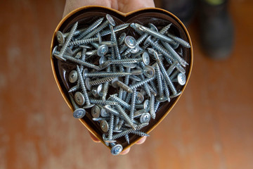 Girlfriend assists with diy man craft. Support your partner. Concept of talant and empathy in...