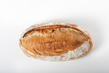 Freshly baked bread  isolated on white background, top view