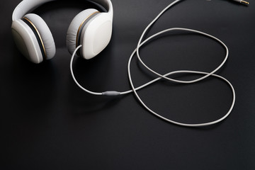 Headphones white isolated on a black background