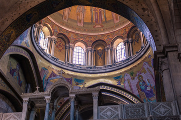 Obraz premium The beautiful mosaic icons decorate the walls of the Church of the Holy Sepulchre. Interior. Old city of Jerusalem