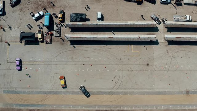drifting cars seen from above drone eye aerial shot ortographic 