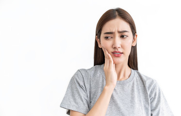 Portrait of asian female feeling painful toothache. Teeth problem woman feeling tooth pain. Closeup...