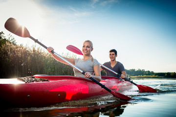 Couple paddling in kayak
