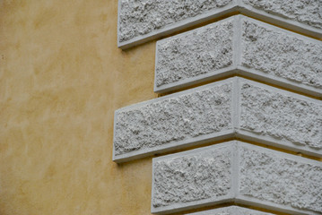Fototapeta premium corner of an external wall with white stones