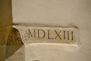 roman numer inscription on an external wall