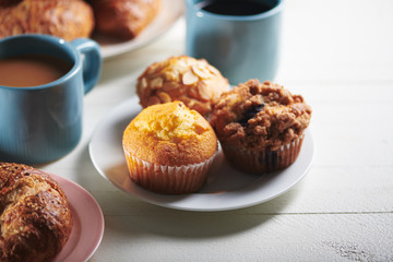 Plate of Muffins and Breakfast Baked Goods with Coffee