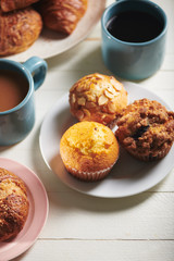 Plate of Muffins and Breakfast Baked Goods with Coffee