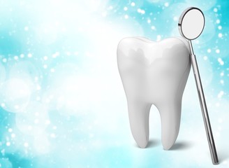 Big tooth and dentist mirror, medical concept