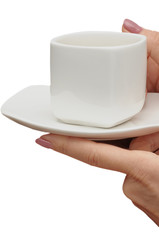 white cup and white saucer