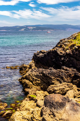 Fisterra or Finisterre scenic rocky coastal view at Playa Ribeira or Ribeira beach, in A Coruna Province, Galicia on the Way of St. James, Camino de Santiago, Spain