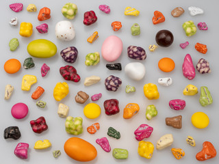 Candies. Sweet food. Caramel stones, sea pebbles. On a neutral background. Still life.