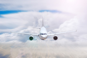 Passenger air plane flying motion blur in the daytime sky overcast, cloudscape.