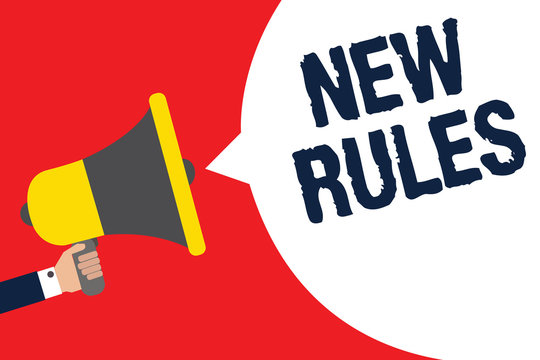 Text sign showing New Rules. Conceptual photo A state of changing an iplemented policy for better upgrade Man holding megaphone loudspeaker speech bubble message speaking loud