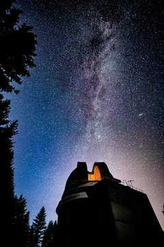 Milky way galaxy over observatory