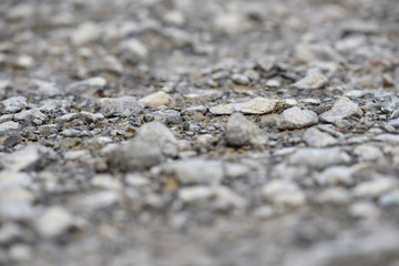 stones on the riverbank near the waterline