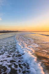 MORNING ATMOSPHERE ON THE BEACH IN THE SUMMER