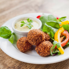 Breaded Haggis Balls - Scottish traditional dish as a starter.