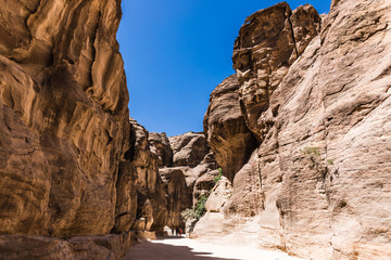 The stone walls of the narrow passage (Siq) that leads to Petra in Jordan